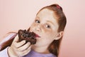 Overweight Girl Eating Brownie