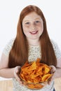 Overweight Girl Holding Bowl Of Snacks