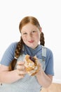 Overweight Girl Holding Pastry