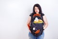 Overweight is a heavy luggage. Obese fat young woman with a grea Royalty Free Stock Photo