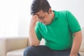 Overweight man depress thinking about his weight problem Royalty Free Stock Photo