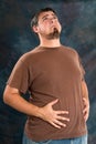 Overweight Man With Indegestion Royalty Free Stock Photo