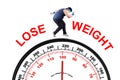 Overweight man with scale Royalty Free Stock Photo