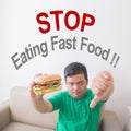 Overweight man stop eating junk food Royalty Free Stock Photo