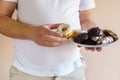 Overweight man with unhealthy fattening food Royalty Free Stock Photo