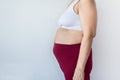 Overweight senior woman pinching her fat body,Cellulite around her belly button,Bloated belly,Healthy lifestyle concept Royalty Free Stock Photo