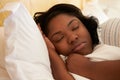 Overweight Woman Asleep In Bed