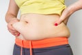 Overweight woman body with fat on belly - obesity concept Royalty Free Stock Photo