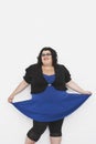 Overweight Woman Curtseying Royalty Free Stock Photo