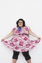 Overweight Woman Curtseying Royalty Free Stock Photo