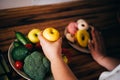 Overweight woman eating healthy taking apple Royalty Free Stock Photo