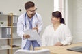 Overweight woman having consultation at doctor's office during medical examination in clinic. Royalty Free Stock Photo