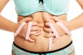 Overweight woman measuring her fat belly Royalty Free Stock Photo