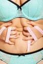 Overweight woman measuring her fat belly Royalty Free Stock Photo