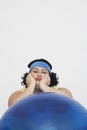 Overweight Woman Sitting Behind Exercise Ball Royalty Free Stock Photo