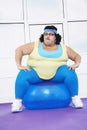 Overweight Woman Sitting On Exercise Ball Royalty Free Stock Photo