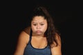 Overweight woman in sportswear on black background Royalty Free Stock Photo