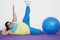 Overweight Woman Stretching Arm And Leg Royalty Free Stock Photo