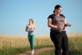 Overweight woman taking slimming pills Royalty Free Stock Photo