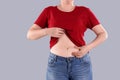 Overweight woman touching belly fat before weight loss Royalty Free Stock Photo