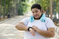 Overweight woman wearing her smartwatch Royalty Free Stock Photo