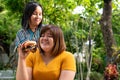 The overweight woman is in a wheelchair. Being eating a burger in which but her friend is not happy because of concern for the Royalty Free Stock Photo