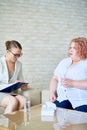 Overweight Young Woman Consulting Psychologist Royalty Free Stock Photo