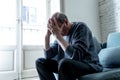 Sad unhappy old senior man suffering from memory loss and alzheimer feeling depressed and lonely Royalty Free Stock Photo