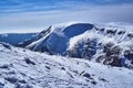 Overwhelmed snow rocky ridge in the Giant Mountains