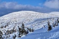 Overwhelmed snow rocky ridge in the Giant Mountains