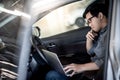 Asian businessman feeling stressed in the car Royalty Free Stock Photo