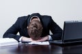 Overworked businessman Royalty Free Stock Photo