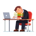 Overworked businessman falling asleep at his desk Royalty Free Stock Photo