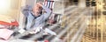 Overworked businessman sitting at a messy desk; multiple exposure Royalty Free Stock Photo