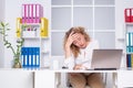 Overworked businesswoman suffering from headache and thinking how to end work. Tired office worker. Woman girl boring in Royalty Free Stock Photo