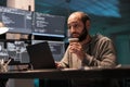 Overworked coder drinking coffee cup and programming Royalty Free Stock Photo