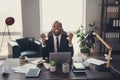 Overworked crazy afro american guy banker lawyer sit desk work laptop have start up development progress innovation Royalty Free Stock Photo