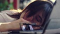 Overworked, Exhausted and tired young businesswoman removes glasses, resting, sleeping over a laptop in a desk at work Royalty Free Stock Photo