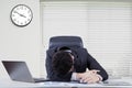 Overworked male worker sleeping in office Royalty Free Stock Photo