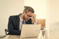 overworked man manager has pain and fatigue. photo of man manager has pain and fatigue. Royalty Free Stock Photo