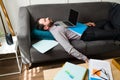 Overworked man sleeping on the couch Royalty Free Stock Photo