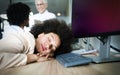 Overworked and tired businesswoman sleeping at work Royalty Free Stock Photo