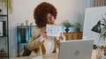 Overworked tired freelance businesswoman works on laptop showing inscription notebook with Help text