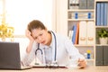 Overworked woman doctor feel headache