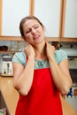 Overworked woman suffering from neck pain. Royalty Free Stock Photo