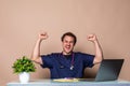 Overworked young doctor sitting in his office Royalty Free Stock Photo