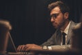 overworking young businessman working with laptop at late night Royalty Free Stock Photo