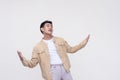 An overzealous young man looking up and proclaiming his love. Isolated on a white background