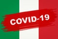 OVID-19 coronavirus epidemic in Italy, banner with inscription COVID19 on Italian flag. Deadly corona virus outbreak in Europe