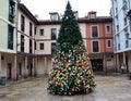 OVIEDO,SPAIN - JANUARY 11,2022: Tree of wishes at the square plaza del Fontan in the Oviedo historic center.Hope that 2022 is the